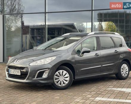 Сірий Пежо 308, об'ємом двигуна 1.56 л та пробігом 275 тис. км за 4999 $, фото 4 на Automoto.ua