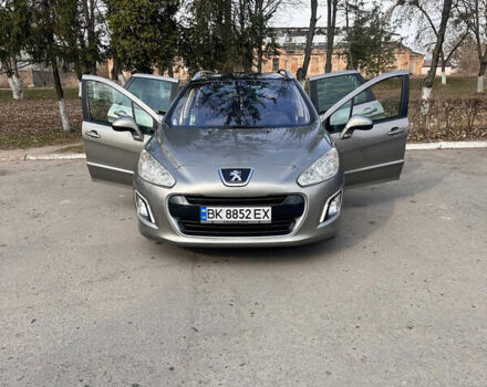 Сірий Пежо 308, об'ємом двигуна 1.56 л та пробігом 282 тис. км за 6099 $, фото 6 на Automoto.ua