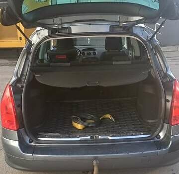 Сірий Пежо 308, об'ємом двигуна 1.56 л та пробігом 248 тис. км за 6050 $, фото 4 на Automoto.ua