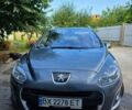 Серый Пежо 308, объемом двигателя 1.6 л и пробегом 230 тыс. км за 4500 $, фото 1 на Automoto.ua