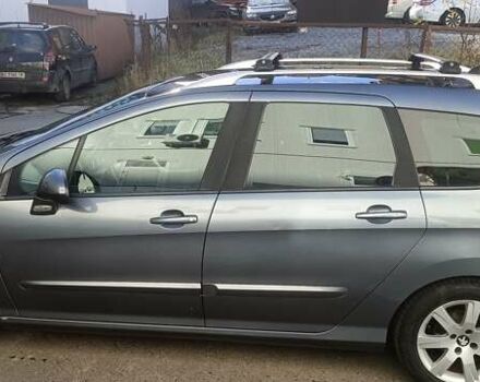 Сірий Пежо 308, об'ємом двигуна 1.56 л та пробігом 248 тис. км за 6050 $, фото 3 на Automoto.ua