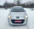 Сірий Пежо 308, об'ємом двигуна 1.6 л та пробігом 228 тис. км за 6999 $, фото 1 на Automoto.ua