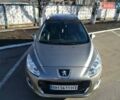 Серый Пежо 308, объемом двигателя 1.6 л и пробегом 240 тыс. км за 7400 $, фото 1 на Automoto.ua