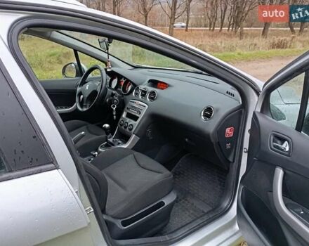 Серый Пежо 308, объемом двигателя 1.6 л и пробегом 245 тыс. км за 6000 $, фото 18 на Automoto.ua