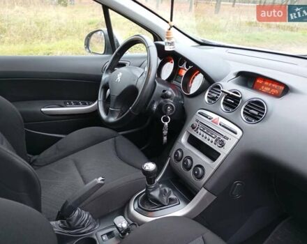 Серый Пежо 308, объемом двигателя 1.6 л и пробегом 245 тыс. км за 6000 $, фото 1 на Automoto.ua