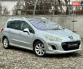 Серый Пежо 308, объемом двигателя 1.56 л и пробегом 245 тыс. км за 7690 $, фото 1 на Automoto.ua