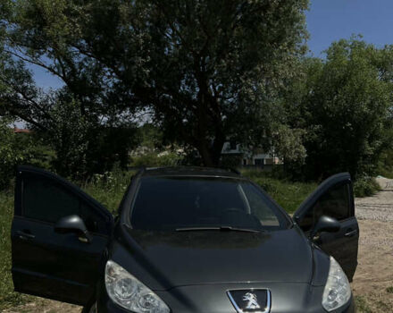 Серый Пежо 308, объемом двигателя 1.56 л и пробегом 260 тыс. км за 6500 $, фото 3 на Automoto.ua