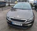 Серый Пежо 308, объемом двигателя 1.56 л и пробегом 260 тыс. км за 8600 $, фото 1 на Automoto.ua