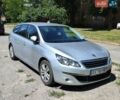 Серый Пежо 308, объемом двигателя 1.56 л и пробегом 153 тыс. км за 9300 $, фото 1 на Automoto.ua