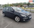 Серый Пежо 308, объемом двигателя 1.56 л и пробегом 304 тыс. км за 6800 $, фото 1 на Automoto.ua