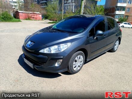 Серый Пежо 308, объемом двигателя 1.4 л и пробегом 265 тыс. км за 5100 $, фото 1 на Automoto.ua
