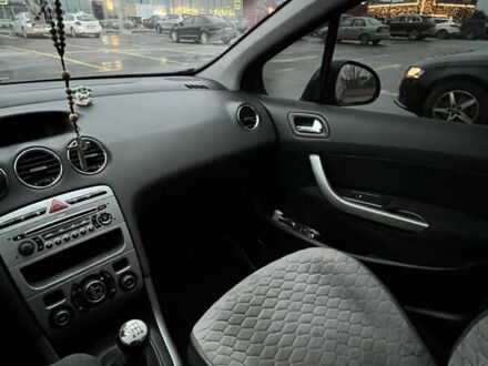 Серый Пежо 308, объемом двигателя 1.56 л и пробегом 232 тыс. км за 5000 $, фото 1 на Automoto.ua