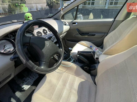 Сірий Пежо 308, об'ємом двигуна 1.56 л та пробігом 321 тис. км за 4800 $, фото 1 на Automoto.ua
