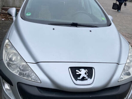 Серый Пежо 308, объемом двигателя 1.56 л и пробегом 238 тыс. км за 5500 $, фото 1 на Automoto.ua