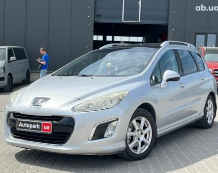Серый Пежо 308, объемом двигателя 2 л и пробегом 243 тыс. км за 8390 $, фото 1 на Automoto.ua