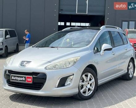 Серый Пежо 308, объемом двигателя 2 л и пробегом 243 тыс. км за 8200 $, фото 1 на Automoto.ua