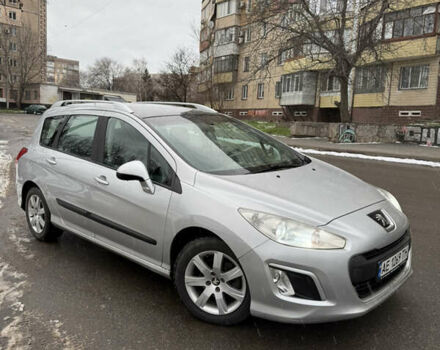 Серый Пежо 308, объемом двигателя 1.56 л и пробегом 250 тыс. км за 4650 $, фото 1 на Automoto.ua