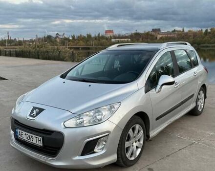 Серый Пежо 308, объемом двигателя 1.56 л и пробегом 250 тыс. км за 4899 $, фото 1 на Automoto.ua