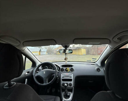 Синий Пежо 308, объемом двигателя 1.6 л и пробегом 204 тыс. км за 3900 $, фото 16 на Automoto.ua
