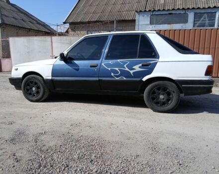 Білий Пежо 309, об'ємом двигуна 1.6 л та пробігом 150 тис. км за 700 $, фото 2 на Automoto.ua