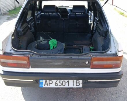 Білий Пежо 309, об'ємом двигуна 1.6 л та пробігом 150 тис. км за 700 $, фото 3 на Automoto.ua