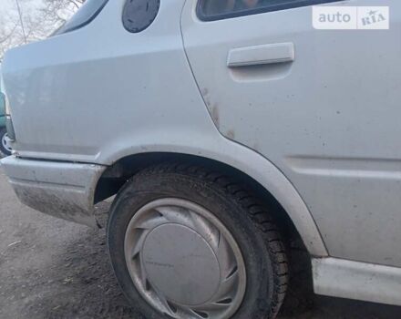 Белый Пежо 309, объемом двигателя 1.6 л и пробегом 300 тыс. км за 800 $, фото 8 на Automoto.ua