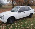 Белый Пежо 309, объемом двигателя 0 л и пробегом 300 тыс. км за 800 $, фото 5 на Automoto.ua