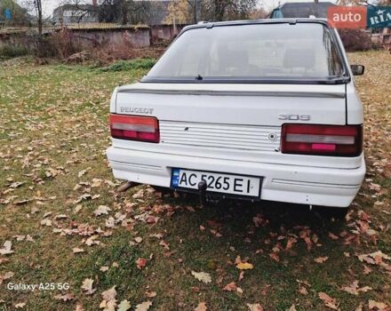 Белый Пежо 309, объемом двигателя 1.3 л и пробегом 300 тыс. км за 800 $, фото 2 на Automoto.ua