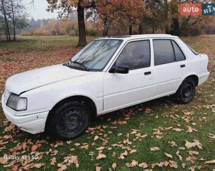 Белый Пежо 309, объемом двигателя 1.3 л и пробегом 300 тыс. км за 800 $, фото 4 на Automoto.ua