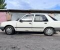 Белый Пежо 309, объемом двигателя 1.3 л и пробегом 376 тыс. км за 1100 $, фото 1 на Automoto.ua