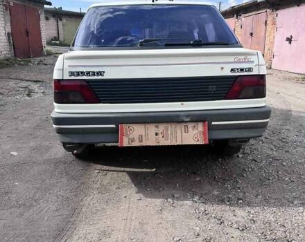 Белый Пежо 309, объемом двигателя 1.3 л и пробегом 376 тыс. км за 1100 $, фото 2 на Automoto.ua