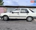Белый Пежо 309, объемом двигателя 1.3 л и пробегом 376 тыс. км за 1100 $, фото 1 на Automoto.ua