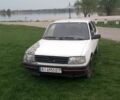 Белый Пежо 309, объемом двигателя 1.4 л и пробегом 1 тыс. км за 600 $, фото 1 на Automoto.ua