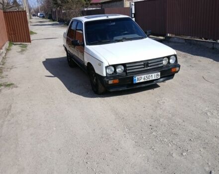 Белый Пежо 309, объемом двигателя 1.6 л и пробегом 150 тыс. км за 700 $, фото 1 на Automoto.ua