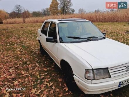 Белый Пежо 309, объемом двигателя 1.3 л и пробегом 300 тыс. км за 800 $, фото 1 на Automoto.ua