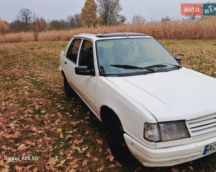 Белый Пежо 309, объемом двигателя 1.3 л и пробегом 300 тыс. км за 800 $, фото 1 на Automoto.ua