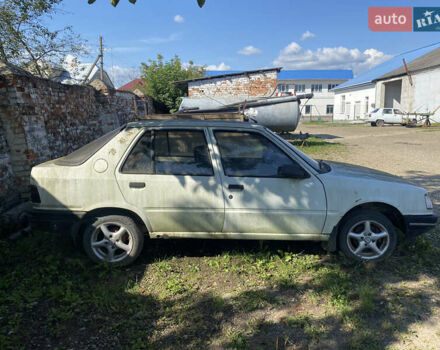 Белый Пежо 309, объемом двигателя 0 л и пробегом 100 тыс. км за 900 $, фото 1 на Automoto.ua