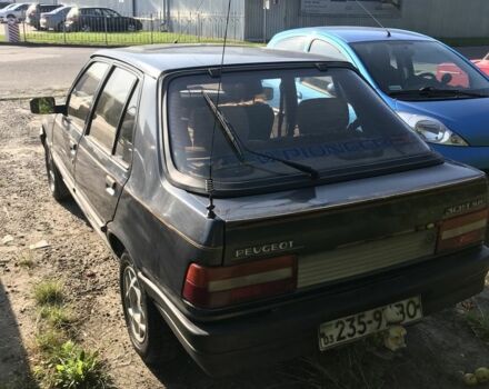 Черный Пежо 309, объемом двигателя 1.6 л и пробегом 320 тыс. км за 850 $, фото 1 на Automoto.ua