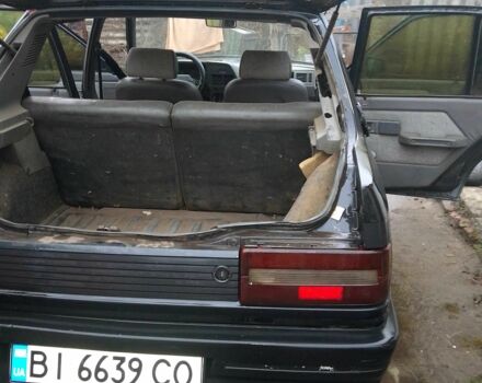 Чорний Пежо 309, об'ємом двигуна 1.4 л та пробігом 78 тис. км за 355 $, фото 1 на Automoto.ua