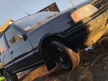 Чорний Пежо 309, об'ємом двигуна 1.4 л та пробігом 89 тис. км за 300 $, фото 1 на Automoto.ua