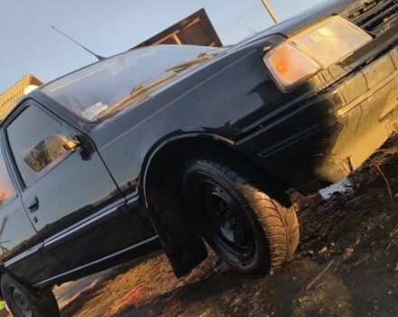 Черный Пежо 309, объемом двигателя 1.4 л и пробегом 89 тыс. км за 300 $, фото 1 на Automoto.ua