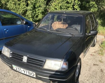Черный Пежо 309, объемом двигателя 1.6 л и пробегом 320 тыс. км за 850 $, фото 1 на Automoto.ua