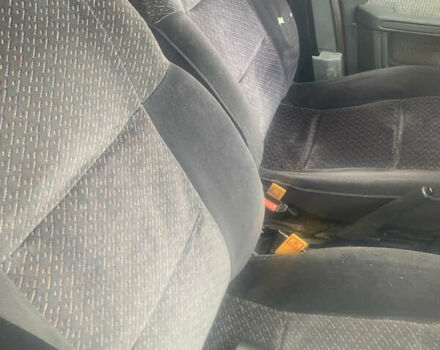 Красный Пежо 309, объемом двигателя 1.6 л и пробегом 100 тыс. км за 950 $, фото 1 на Automoto.ua