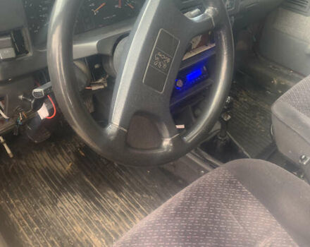 Красный Пежо 309, объемом двигателя 1.6 л и пробегом 100 тыс. км за 950 $, фото 2 на Automoto.ua