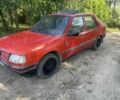 Красный Пежо 309, объемом двигателя 1.9 л и пробегом 350 тыс. км за 770 $, фото 1 на Automoto.ua