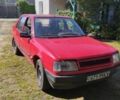 Красный Пежо 309, объемом двигателя 2 л и пробегом 300 тыс. км за 900 $, фото 2 на Automoto.ua