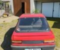 Красный Пежо 309, объемом двигателя 2 л и пробегом 300 тыс. км за 900 $, фото 3 на Automoto.ua