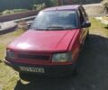 Красный Пежо 309, объемом двигателя 2 л и пробегом 300 тыс. км за 900 $, фото 1 на Automoto.ua
