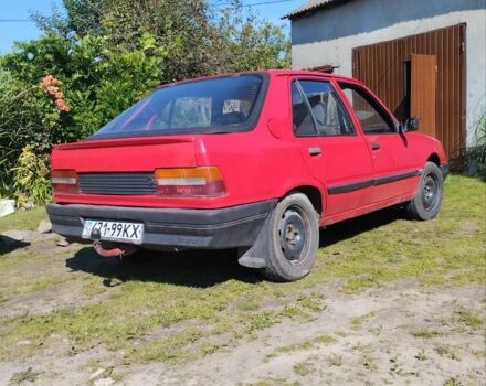 Красный Пежо 309, объемом двигателя 2 л и пробегом 300 тыс. км за 900 $, фото 5 на Automoto.ua