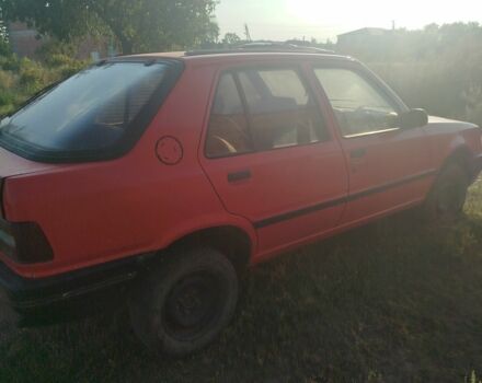 Червоний Пежо 309, об'ємом двигуна 2 л та пробігом 60 тис. км за 650 $, фото 7 на Automoto.ua
